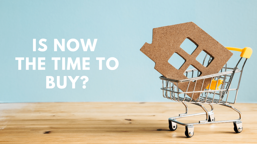 Real estate downturn investing: A small shopping cart holding a house-shaped cutout, symbolizing opportunities to buy properties in challenging economic times.